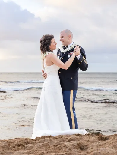 Elopement photographer Kauai — intimate sunset ceremony Na Pali Coast